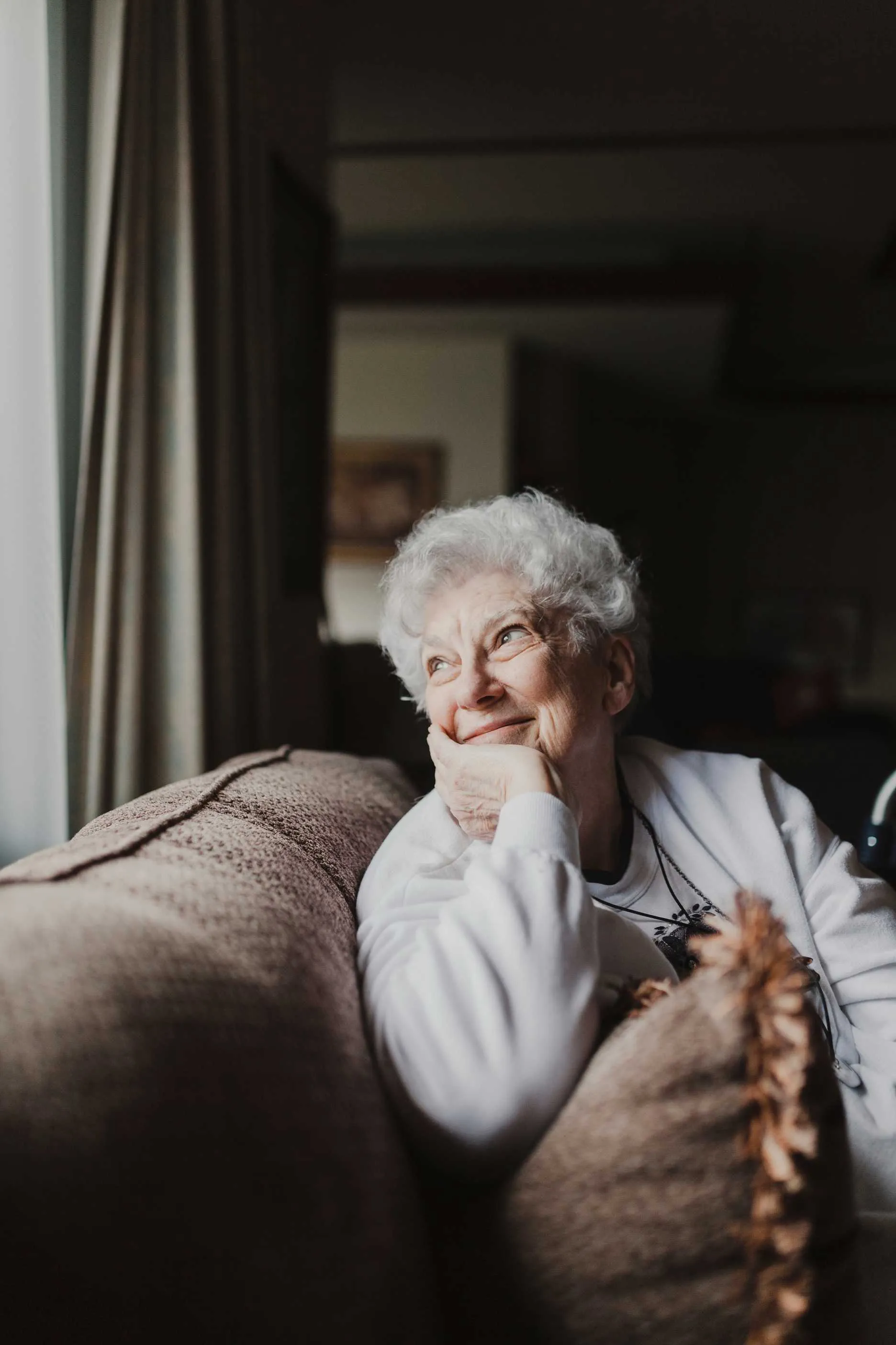Senior smiling at home